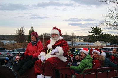 Marion Holiday Stroll 
Here Comes Santa Claus! – Santa made his big entrance to the Marion Holiday Stroll on Sunday, December 8, from across Sippican Harbor on his ‘water sleigh’ to the crowd that awaited him at the Town Wharf. The holiday stroll is the perfect way to get into the holiday spirit and capture a bit of that Christmas magic. Photo by Jean Perry
