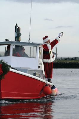 Marion Holiday Stroll 
Here Comes Santa Claus! – Santa made his big entrance to the Marion Holiday Stroll on Sunday, December 8, from across Sippican Harbor on his ‘water sleigh’ to the crowd that awaited him at the Town Wharf. The holiday stroll is the perfect way to get into the holiday spirit and capture a bit of that Christmas magic. Photo by Jean Perry
