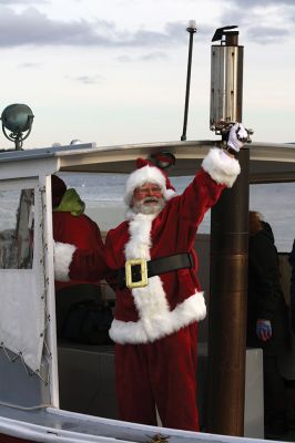 Marion Holiday Stroll 
Here Comes Santa Claus! – Santa made his big entrance to the Marion Holiday Stroll on Sunday, December 8, from across Sippican Harbor on his ‘water sleigh’ to the crowd that awaited him at the Town Wharf. The holiday stroll is the perfect way to get into the holiday spirit and capture a bit of that Christmas magic. Photo by Jean Perry
