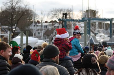 Marion Holiday Stroll 
Here Comes Santa Claus! – Santa made his big entrance to the Marion Holiday Stroll on Sunday, December 8, from across Sippican Harbor on his ‘water sleigh’ to the crowd that awaited him at the Town Wharf. The holiday stroll is the perfect way to get into the holiday spirit and capture a bit of that Christmas magic. Photo by Jean Perry
