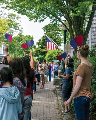 Hannah Strom Homecoming 
Hundreds of supporters lined the sidewalks along Front Street in Marion village on June 3 to welcome home Hannah Strom. After spending several months in hospitals in Florida and Boston, the Tabor Academy graduate and member of the Holy Cross women's rowing team returned to her Pitcher Street residence to continue her recovery from severe injuries sustained in a January 15 collision with a pickup truck in Vero Beach that took the life of her teammate Grace Rett and injured her coach and several other teammat
