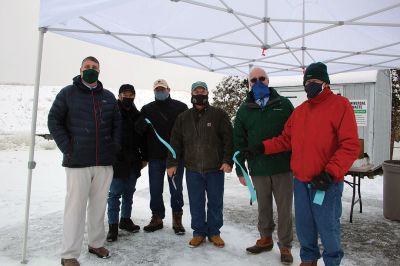 Benson Brook Transfer Station
Town of Marion officials cut the ribbon on the Benson Brook Transfer Station to Marion and Rochester residents on January 27. From the left: Town Administrator Jay McGrail, Selectman John Waterman, Bob Partridge, Board of Selectmen Chairman Randy Parker, Stephen Cushing, and Selectman Norm Hills. Adjacent photo, Parker displays future plans for the station. Photos by Mick Colageo
