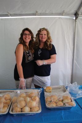 Mattapoisett Council on Aging
Administrative coordinator Jessica Fraine and Mattapoisett resident and Council on Aging volunteer Paula Coffey take a quick break from food service, as many staff and volunteers helped the Mattapoisett COA celebrate its 50th anniversary on Saturday outside Center School. Photos by Marilou Newell and Mick Colageo
