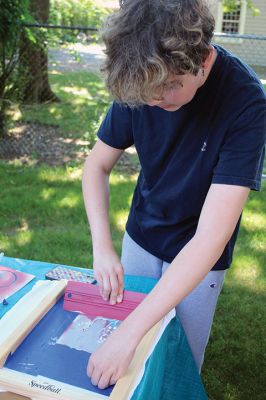 Screen-printing Class
Young and old took part as the Mattapoisett Library held a class in screen-printing textiles on Saturday under the direction of Reference Librarian Michelle Skaar. Photos by Mick Colageo
