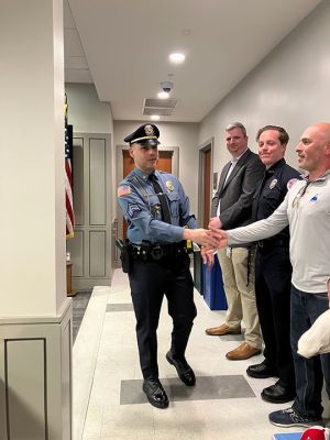 Mattapoisett Police 
On April 25, Mattapoisett Police Officer Alberto Cardoso was surrounded by family, friends, school officials and others as he was sworn in to the rank of sergeant. Chief Jason King, pictured with Cardoso and Lieutenant Justin King, said that Cardoso’s career is marked by a commitment to service and dedication. Since 2013 when he returned to area from Florida where he had served as a deputy sheriff in Manatee County, King stated that Cardoso, "... has consistently demonstrated his willingness to go above and
