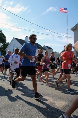 Mattapoisett Road Race
Will Benoit and Margot Appleton defended their respective men’s and women’s titles in the July 4 Mattapoisett Road Race, and competitors were greeted by favorable weather for the 9:00 am start. Photos by Mick Colageo
