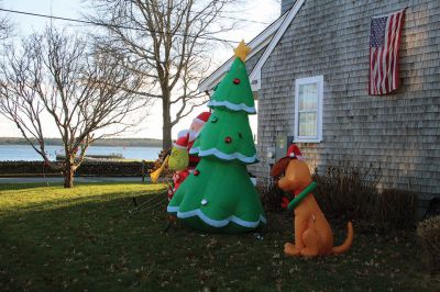 Christmas Scenes
Salty the Seahorse is in the holiday spirit, while Rudolph seems to have lost an antler at Town Hall and one village home’s gathering of Christmas characters overlooks Mattapoisett harbor. Photos by Mick Colageo
