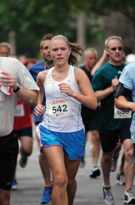 Mattapoisett Road Race
On Wednesday, July 4, over 1,000 runners braved the rain to participate in the Annual Mattapoisett Road Race.  All money raised from the 5-mile race will benefit graduating students from Old Rochester Regional High School.  Photo by Felix Perez.
