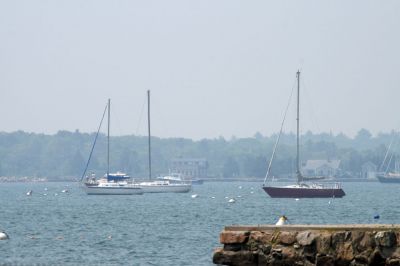 Smoke on the Water
A smoky haze hung over Mattapoisett on May 31, 2010, when a wind brought smoke from the Canadian wildfires to the Massachusetts area. The Mattapoisett fire department responded to several calls of smoke in the area as a result of the haze. Photo by Anne O'Brien-Kakley.
