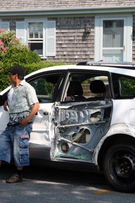 Village Accident
An accident on May 31, 2010 at the corner of North and Church Street in Mattapoisett village snagged Memorial Day traffic. Immigration Custom Enforcement (ICE) services were called to investigate some of the occupants, who were allegedly illegal immigrants. Photo by Anne O'Brien-Kakley.
