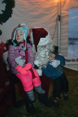 Holiday in the Park
It looked like another record turnout at Shipyard Park in Mattapoisett on December 9 for the annual Holiday in the Park and tree lighting. The tent was stuffed with hot foods, cocoa, donuts, Christmas cookies, and the hundreds of people in line to warm up out of the snowy cold. Did you miss the tree lighting? See The Wanderer Facebook page for a video capturing the magical moment. Photos by Jean Perry 
