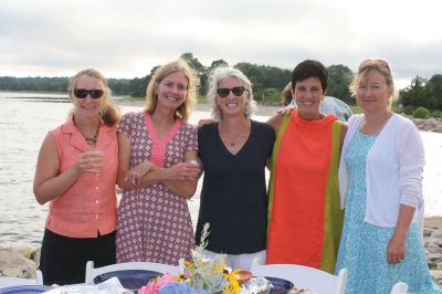 An Affair to Remember 
The Great Community Picnic on August 3 brought 345 residents out to the Munro Preserve in Mattapoisett to enjoy a late afternoon gathering hosted by the Mattapoisett Land Trust and the Historical Society. Along with great food and great wine, guests also arranged some great table centerpieces for their tables. Photos by Jean Perry
