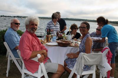 An Affair to Remember 
The Great Community Picnic on August 3 brought 345 residents out to the Munro Preserve in Mattapoisett to enjoy a late afternoon gathering hosted by the Mattapoisett Land Trust and the Historical Society. Along with great food and great wine, guests also arranged some great table centerpieces for their tables. Photos by Jean Perry
