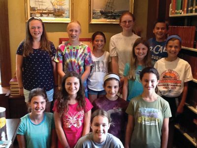 Mattapoisett Library Writing Workshop
Students from the Mattapoisett Library Writing Workshop. This is the third year these students have participated in this program. Pictured here: Top row (left to right): Grayson Lord, Tova Brickley, Audrey Knox, Kate Downey, Joseph Sheridan; Middle two: Erin Besancon, Julia Sheridan; Lower Row: Sarah Besancon, Brianna Lynch, Emma Gabriel, Felicia Aguiar; In front: Meghan McCullough 
