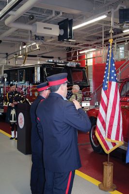 Mattapoisett Fire Station
The Mattapoisett Fire Station Building Committee has seen through to completion the town’s new facility on Route 6. Before the December 11 raising of the American flag, hundreds gathered inside to hear from the committee’s members and town officials. Fire Chief Andrew Murray presented the shovel that first broke ground to Committee Chairman Mike Hickey and certificates of appreciation to Hickey, Committee member William Kantor, Fire Department Captain Jordan Collyer, Photos by Mick Colageo
