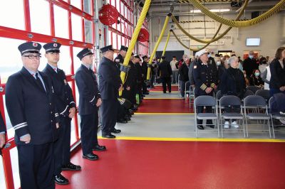 Mattapoisett Fire Station
The Mattapoisett Fire Station Building Committee has seen through to completion the town’s new facility on Route 6. Before the December 11 raising of the American flag, hundreds gathered inside to hear from the committee’s members and town officials. Fire Chief Andrew Murray presented the shovel that first broke ground to Committee Chairman Mike Hickey and certificates of appreciation to Hickey, Committee member William Kantor, Fire Department Captain Jordan Collyer, Photos by Mick Colageo
