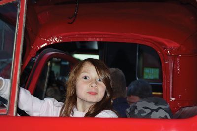 Mattapoisett Fire Station Open House
The Mattapoisett Fire Station was packed with hundreds of children and their grown-ups for the October 9 Open House during Fire Prevention Week, enjoying the balloons, face painting, plastic firefighter hats, and free Chinese food. Kids got the chance to climb over the fire trucks and stop, drop, and roll inside the Kids’ Fire Safety House. Photos by Jean Perry 
