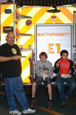 Mattapoisett Fire Station Open House
The Mattapoisett Fire Station was packed with hundreds of children and their grown-ups for the October 9 Open House during Fire Prevention Week, enjoying the balloons, face painting, plastic firefighter hats, and free Chinese food. Kids got the chance to climb over the fire trucks and stop, drop, and roll inside the Kids’ Fire Safety House. Photos by Jean Perry 
