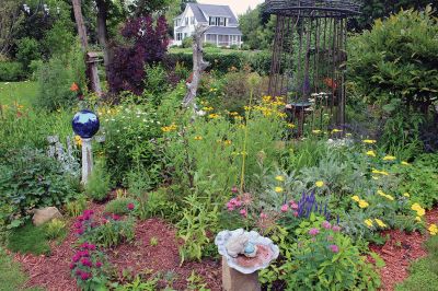 Mattapoisett Woman's Club Garden Tour
The Mattapoisett Woman's Club Garden Tour covered properties on both sides of Route 6 including homes in the village area and two addresses at the Bay Club on June 24. Photos by Mick Colageo
