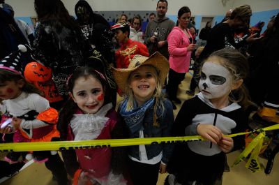 2013 Mattapoisett Halloween Parade
The weather didn’t dampen the spirits in Mattapoisett as the Police Department hosted yet another great parade and costume contest. Photo by Felix Perez 
