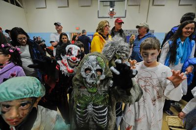 2013 Mattapoisett Halloween Parade
The weather didn’t dampen the spirits in Mattapoisett as the Police Department hosted yet another great parade and costume contest. Photo by Felix Perez 
