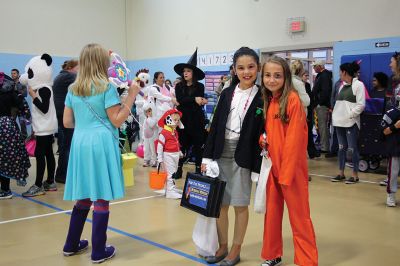 Annual Halloween Costume Contest 
The Mattapoisett Police Department’s Annual Halloween Costume Contest had spectators spinning in circles as the most creative than ever costumes paraded around the Center School gymnasium Thursday night. The costumes were such a hit, even the judges had a hard time choosing the winners of each age group. Photos by Jean Perry
