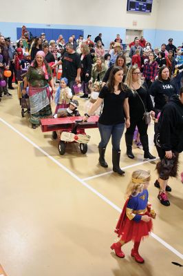 Annual Halloween Costume Contest 
The Mattapoisett Police Department’s Annual Halloween Costume Contest had spectators spinning in circles as the most creative than ever costumes paraded around the Center School gymnasium Thursday night. The costumes were such a hit, even the judges had a hard time choosing the winners of each age group. Photos by Jean Perry
