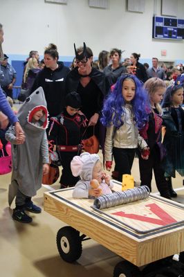 Annual Halloween Costume Contest 
The Mattapoisett Police Department’s Annual Halloween Costume Contest had spectators spinning in circles as the most creative than ever costumes paraded around the Center School gymnasium Thursday night. The costumes were such a hit, even the judges had a hard time choosing the winners of each age group. Photos by Jean Perry
