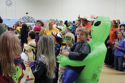 Annual Halloween Costume Contest 
The Mattapoisett Police Department’s Annual Halloween Costume Contest had spectators spinning in circles as the most creative than ever costumes paraded around the Center School gymnasium Thursday night. The costumes were such a hit, even the judges had a hard time choosing the winners of each age group. Photos by Jean Perry
