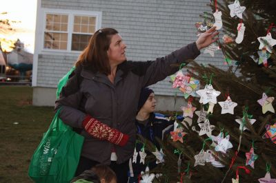 Holiday in the Park
T’was the fortnight before Christmas and all through the park, every creature was stirring including Santa, Mrs. Claus, Rudolph, and Frosty the Snowman! On Saturday, December 10, hundreds turned out for Mattapoisett’s holiday celebration at Shipyard Park where fun, free food, and frolicking characters made for a great night of revelry leading up to the tree lighting. Photos by Jean Perry
