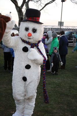 Holiday in the Park
T’was the fortnight before Christmas and all through the park, every creature was stirring including Santa, Mrs. Claus, Rudolph, and Frosty the Snowman! On Saturday, December 10, hundreds turned out for Mattapoisett’s holiday celebration at Shipyard Park where fun, free food, and frolicking characters made for a great night of revelry leading up to the tree lighting. Photos by Jean Perry

