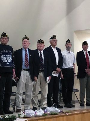 Mattapoisett Memorial Day
American Legion Florence Eastman Post 280 hosted the annual Mattapoisett Memorial Day observances with a moving ceremony held at Center School. Pictured are members of the legion with Veteran's Agent Chris Gerrior, who is also seen saluting after placing flowers at Memorial Park. The Mattapoisett Police color guard took part in the procession. American Legion member George Randall recited the Gettysburg Address, Old Rochester Regional Junior High student Sasha Volkema read the governor's proclamation and re
