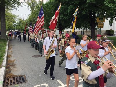 Mattapoisett Memorial Day
Mattapoisett Board of Selectmen along with members of the American Legion Florence Eastman Post 280, Rep. William Straus, and special guest Col. Chris Kidd attended the Memorial Day observances at Center School on May 28. The Old Hammondtown School concert band under the direction of Cara Kinney played patriotic tunes to a full house, and afterwards the Memorial Day parade headed to the Civil War monument at the library. Photos by Marilou Newell
