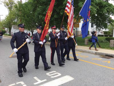 Mattapoisett Memorial Day
Mattapoisett Board of Selectmen along with members of the American Legion Florence Eastman Post 280, Rep. William Straus, and special guest Col. Chris Kidd attended the Memorial Day observances at Center School on May 28. The Old Hammondtown School concert band under the direction of Cara Kinney played patriotic tunes to a full house, and afterwards the Memorial Day parade headed to the Civil War monument at the library. Photos by Marilou Newell
