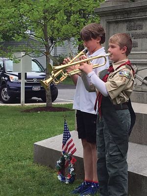 Mattapoisett Memorial Day
Mattapoisett Board of Selectmen along with members of the American Legion Florence Eastman Post 280, Rep. William Straus, and special guest Col. Chris Kidd attended the Memorial Day observances at Center School on May 28. The Old Hammondtown School concert band under the direction of Cara Kinney played patriotic tunes to a full house, and afterwards the Memorial Day parade headed to the Civil War monument at the library. Photos by Marilou Newell
