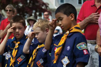 Mattapoisett’s Memorial Day 
Members of cub scout Troop 53 salute while singing “The Star-Spangled Banner” at Mattapoisett’s Memorial Day ceremony on May 28, 2012. Photo by Eric Tripoli.

