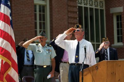 Mattapoisett’s Memorial Day 
The remaining members of the Florence Eastman Post 280 American Legion salute the American flag while the Old Hammondtown Band plays “The Star-Spangled Banner” on May 28, 2012. Photo by Eric Tripoli.
