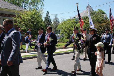  Mattapoisett Memorial Day 
It was a great turnout for the Mattapoisett Memorial Day observance on Monday afternoon, which began at Center School and then proceeded to the library for the placement of flowers on the monuments before parading over to Town Wharf to place a wreath in the outgoing tide to honor those lost at sea. Photos by Jean Perry
