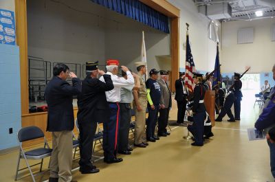 Memorial Day
The rain cancelled the parade and forced the Memorial Day observance indoors on Monday, but many gathered to honor our fallen soldiers and their families inside Center School. Keynote speaker Commander Bryan D. Williams gave a heartfelt speech, while George Randall recited the Gettysburg Address to mark the 100th anniversary of when his father, Jeremiah, first read it on Memorial Day in 1917 at the age of 15. Photos by Sarah French Storer
