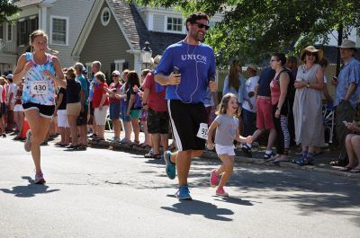 Race to the Finish 
July 4th morning in Mattapoisett means its time for the annual Mattapoisett July 4th Road Race, a five-miler that starts and finishes at Shipyard Park. The proceeds fund scholarships to ORR graduates. Photos by Sarah French Storer
