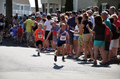 Race to the Finish 
July 4th morning in Mattapoisett means its time for the annual Mattapoisett July 4th Road Race, a five-miler that starts and finishes at Shipyard Park. The proceeds fund scholarships to ORR graduates. Photos by Sarah French Storer
