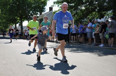 Race to the Finish 
July 4th morning in Mattapoisett means its time for the annual Mattapoisett July 4th Road Race, a five-miler that starts and finishes at Shipyard Park. The proceeds fund scholarships to ORR graduates. Photos by Sarah French Storer
