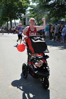 Race to the Finish 
July 4th morning in Mattapoisett means its time for the annual Mattapoisett July 4th Road Race, a five-miler that starts and finishes at Shipyard Park. The proceeds fund scholarships to ORR graduates. Photos by Sarah French Storer
