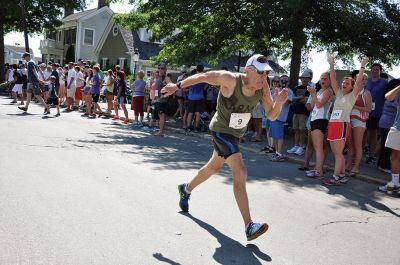 Race to the Finish 
July 4th morning in Mattapoisett means its time for the annual Mattapoisett July 4th Road Race, a five-miler that starts and finishes at Shipyard Park. The proceeds fund scholarships to ORR graduates. Photos by Sarah French Storer
