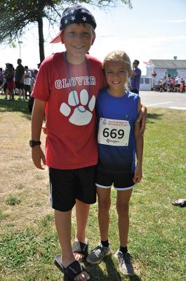 Race to the Finish 
July 4th morning in Mattapoisett means its time for the annual Mattapoisett July 4th Road Race, a five-miler that starts and finishes at Shipyard Park. The proceeds fund scholarships to ORR graduates. Photos by Sarah French Storer
