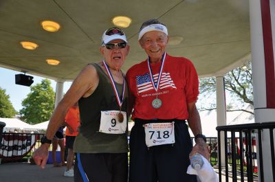 Race to the Finish 
July 4th morning in Mattapoisett means its time for the annual Mattapoisett July 4th Road Race, a five-miler that starts and finishes at Shipyard Park. The proceeds fund scholarships to ORR graduates. Photos by Sarah French Storer
