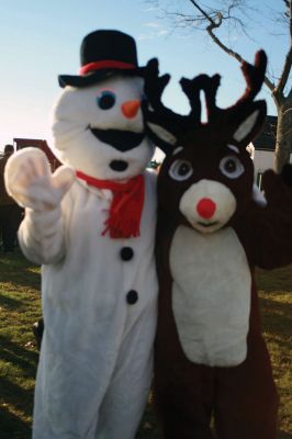 Mattapoisett Christmas
Santa, Rudolph, and Frosty -- plus food, crafts for kids, and the annual tree lighting are some of the hallmarks of a Mattapoisett Christmas. The Mattapoisett Lion’s Club in partnership with local businesses hosted the annual tree lighting at Shipyard Park on Saturday, December 13. The Lions also collected toys and canned goods in support of local charities. Photos by Marilou Newell
