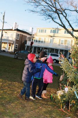 Mattapoisett Christmas
Santa, Rudolph, and Frosty -- plus food, crafts for kids, and the annual tree lighting are some of the hallmarks of a Mattapoisett Christmas. The Mattapoisett Lion’s Club in partnership with local businesses hosted the annual tree lighting at Shipyard Park on Saturday, December 13. The Lions also collected toys and canned goods in support of local charities. Photos by Marilou Newell
