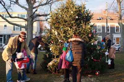 Mattapoisett Christmas
Santa, Rudolph, and Frosty -- plus food, crafts for kids, and the annual tree lighting are some of the hallmarks of a Mattapoisett Christmas. The Mattapoisett Lion’s Club in partnership with local businesses hosted the annual tree lighting at Shipyard Park on Saturday, December 13. The Lions also collected toys and canned goods in support of local charities. Photos by Marilou Newell
