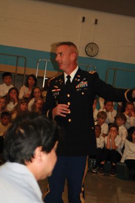 Veterans Day Ceremony in Mattapoiset
Col. Joseph McGraw was the guest speaker during the Veterans Day Ceremony at Old Hammondtown School. McGraw has a long and impressive military career. He graduated in 1994 from U.S. Military Academy and achieved successive ranks to become a full colonel in 2015. George Randall, member of the Florence Eastman Post of the American Legion, recited the preamble to the American Constitution and the Gettysburg Address before a standing-room only audience during the November 11 Veterans Day Ceremony in Mattapoiset
